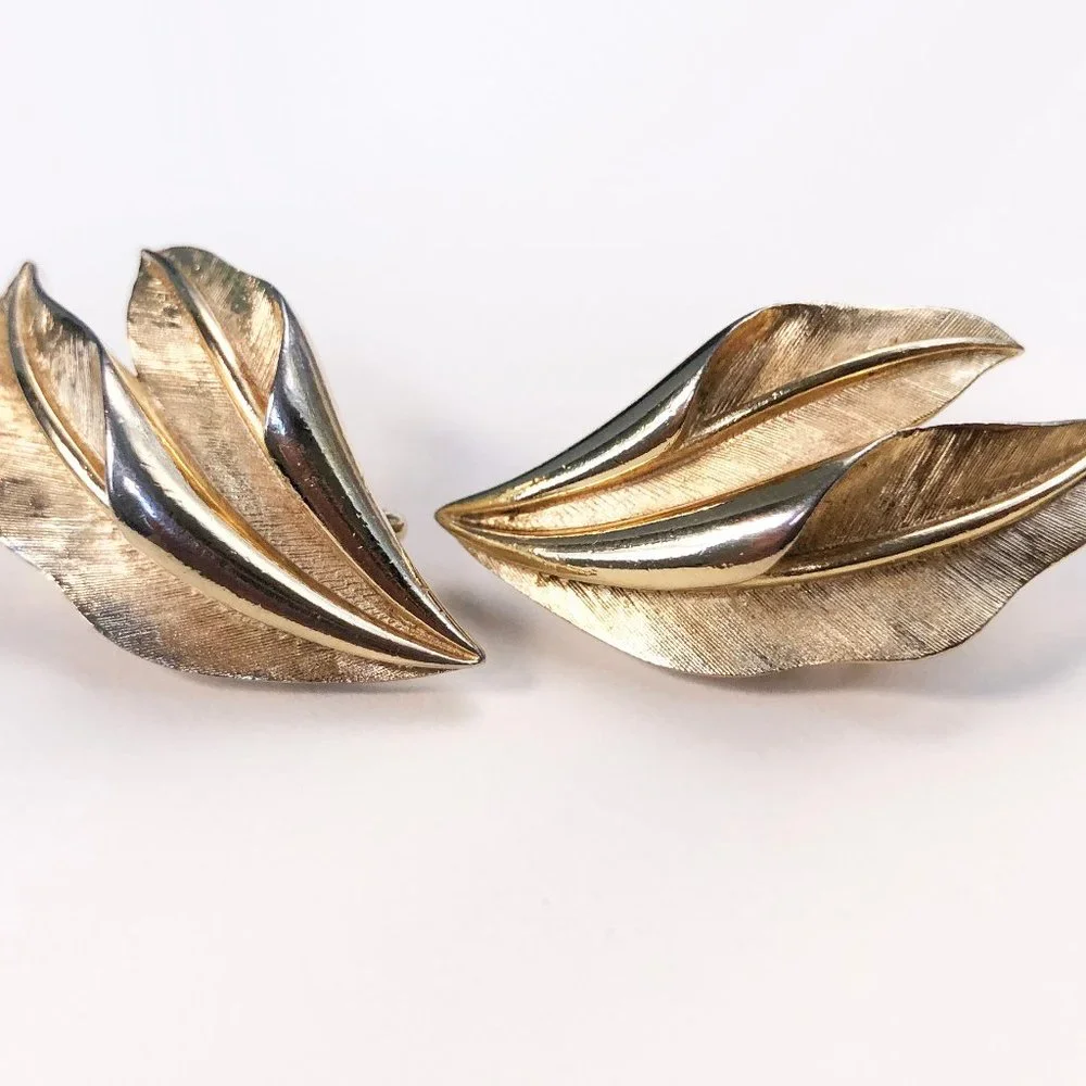 Gold leaf earrings clip on, signed Crown Trifari matt gold tone leaves earrings